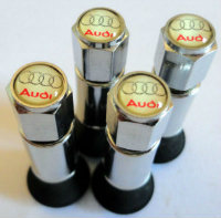 4 bouchons + valve de gonflage alu audi blanc